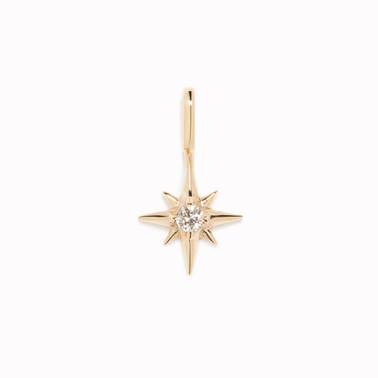 Diamond Star Charm 14k Gold pendant featuring a round-cut diamond set in polished 14k yellow gold