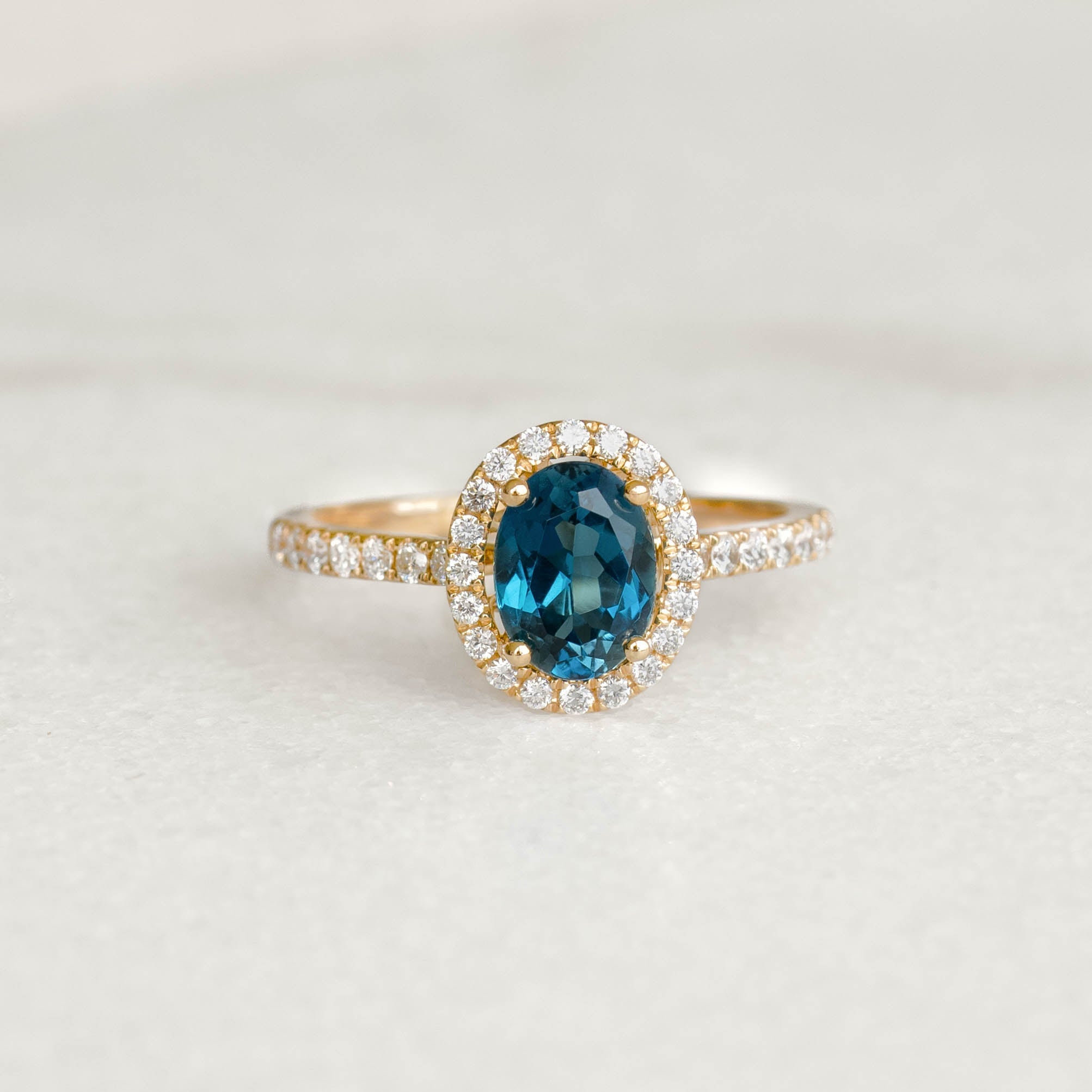 Oval London Blue Topaz Halo Ring 14k Gold Suna Linjer Jewelry