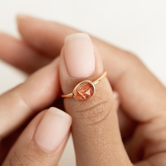 Sunstone ring in gold vermeil on model