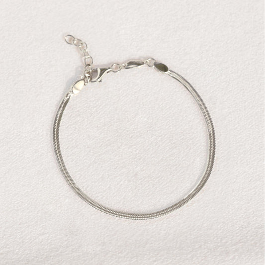 Snake Chain Bracelet Silver in sterling silver with a sleek 2.3mm width displayed on a neutral background