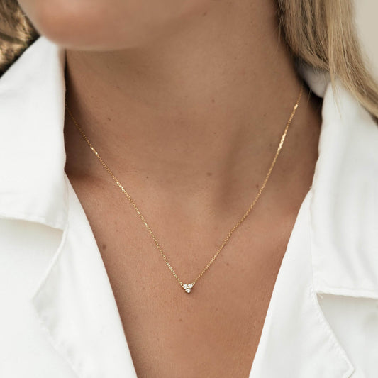 White gemstone necklace in gold vermeil on model