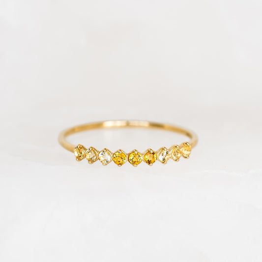 November Birthstone Ring 14k Gold - Ombre Citrine with nine sparkling citrine gemstones on a white marble background