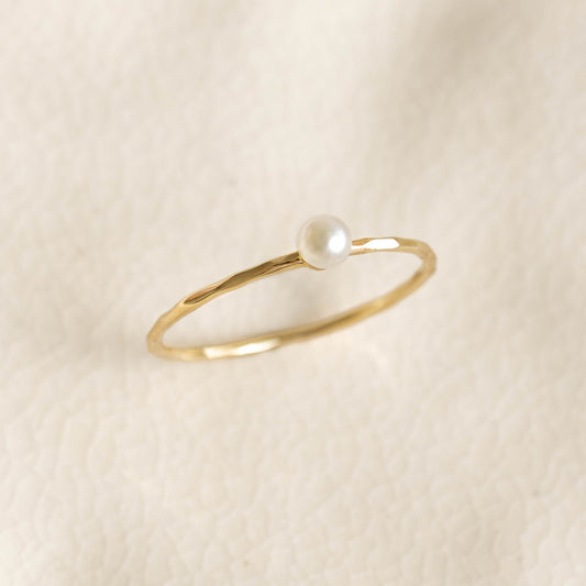 Pearl Ring 14k Gold - Arden featuring a hammered gold band with a single small freshwater pearl on a neutral background