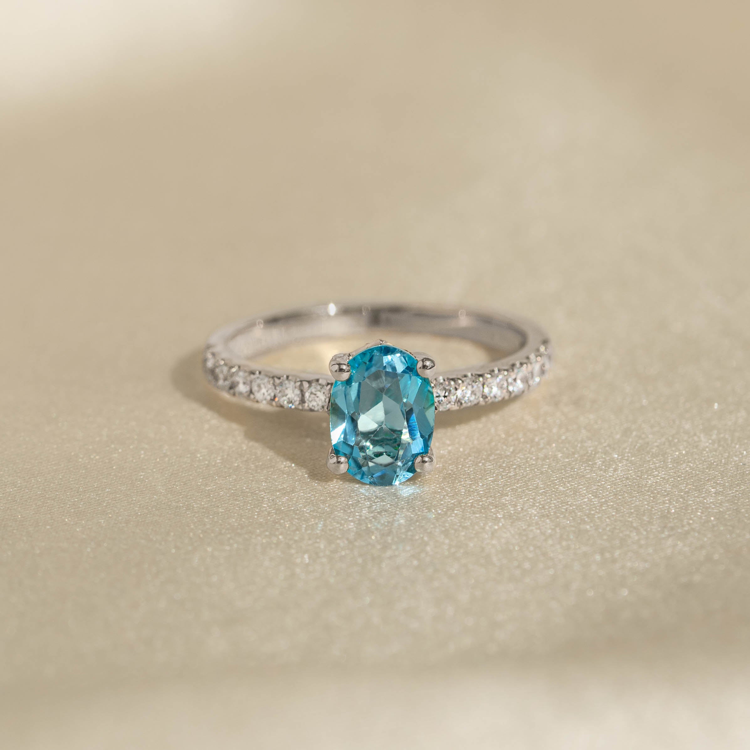 Oval Swiss Blue Topaz and Diamond Ring White Gold Minette