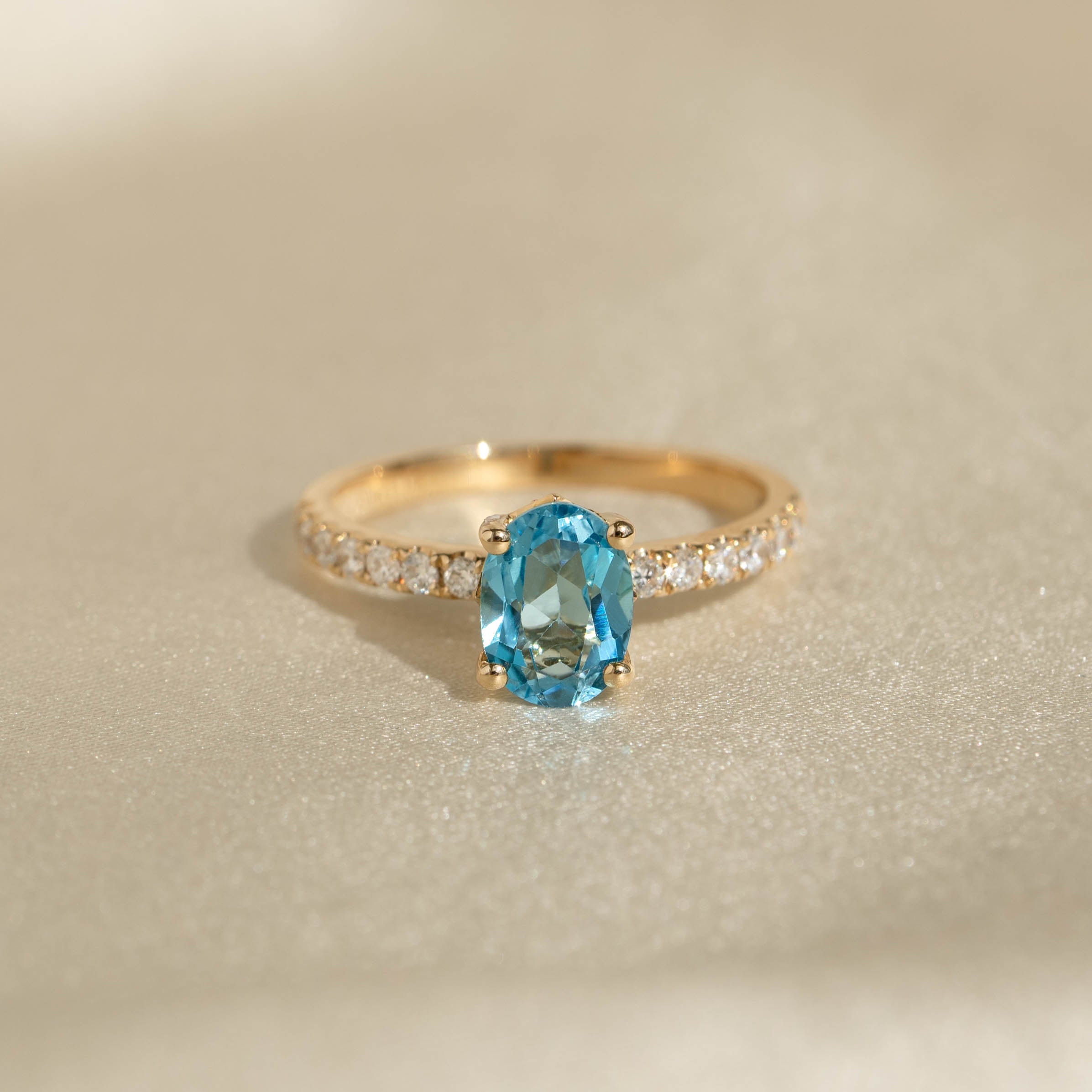 Oval Swiss Blue Topaz and Diamond Ring 14k Gold Minette Linjer