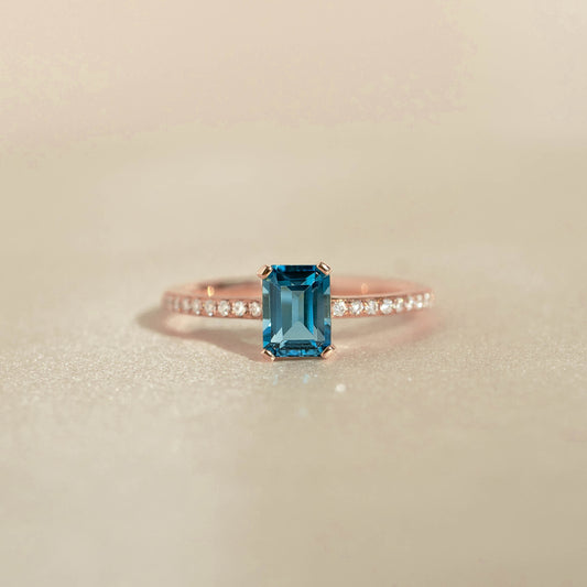Baguette London Blue Topaz and Diamond Ring Rose Gold - Safiya with rectangular blue topaz and pavé diamonds on rose gold band