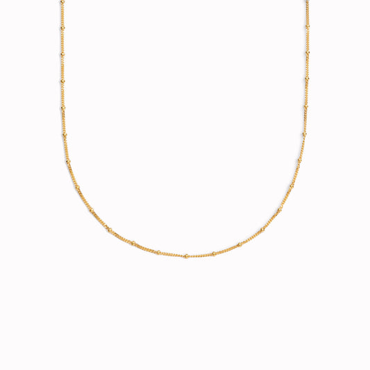 Gold beaded diamond cut chain necklace