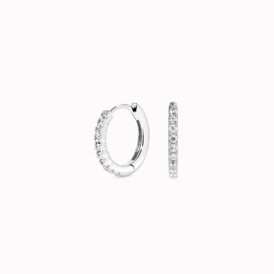 1.5mm thick silver huggie earrings with white gemstones