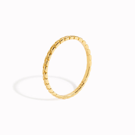 Gold stacking ring with braid design