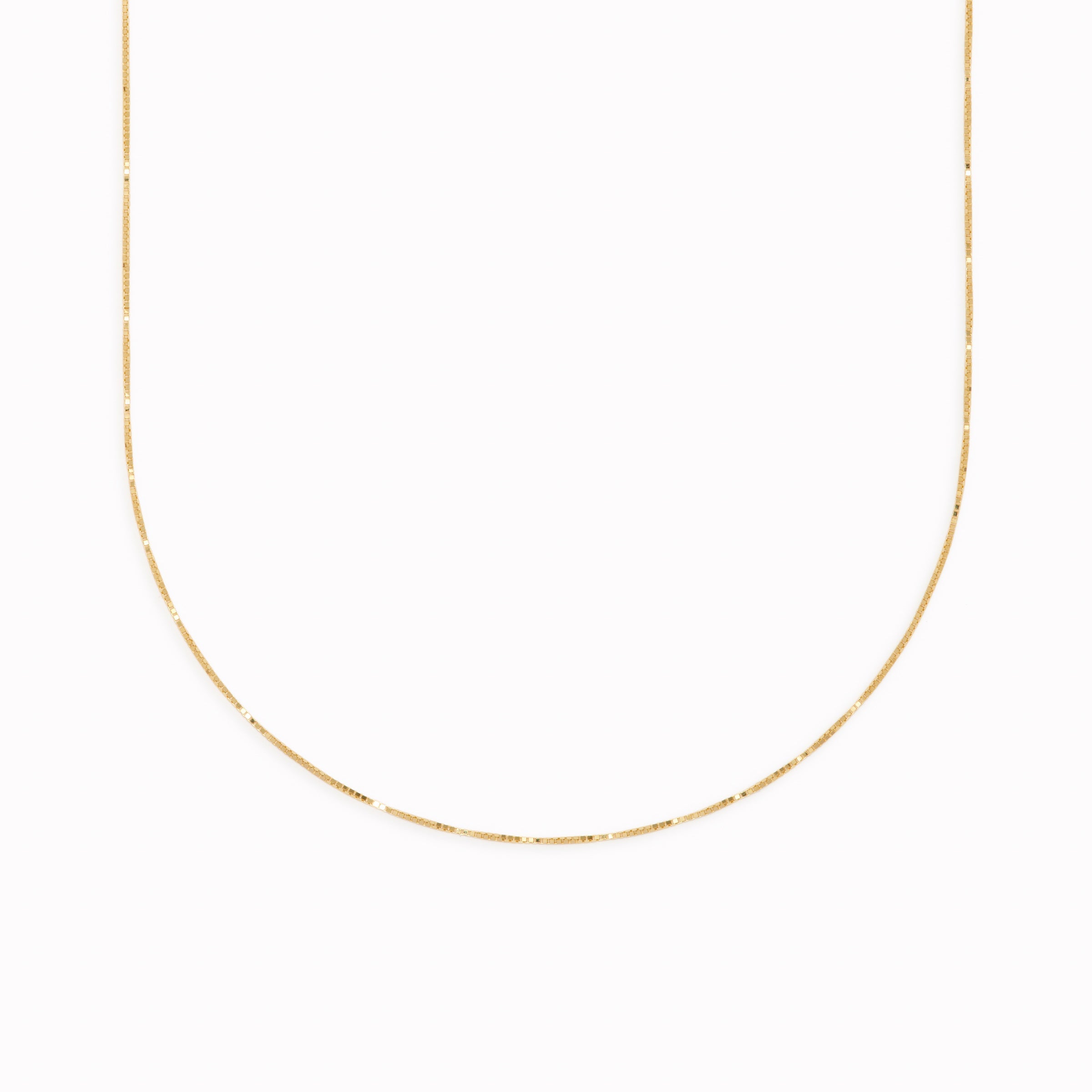14k gold box chain necklace with a fine, minimalistic design on a clean white background