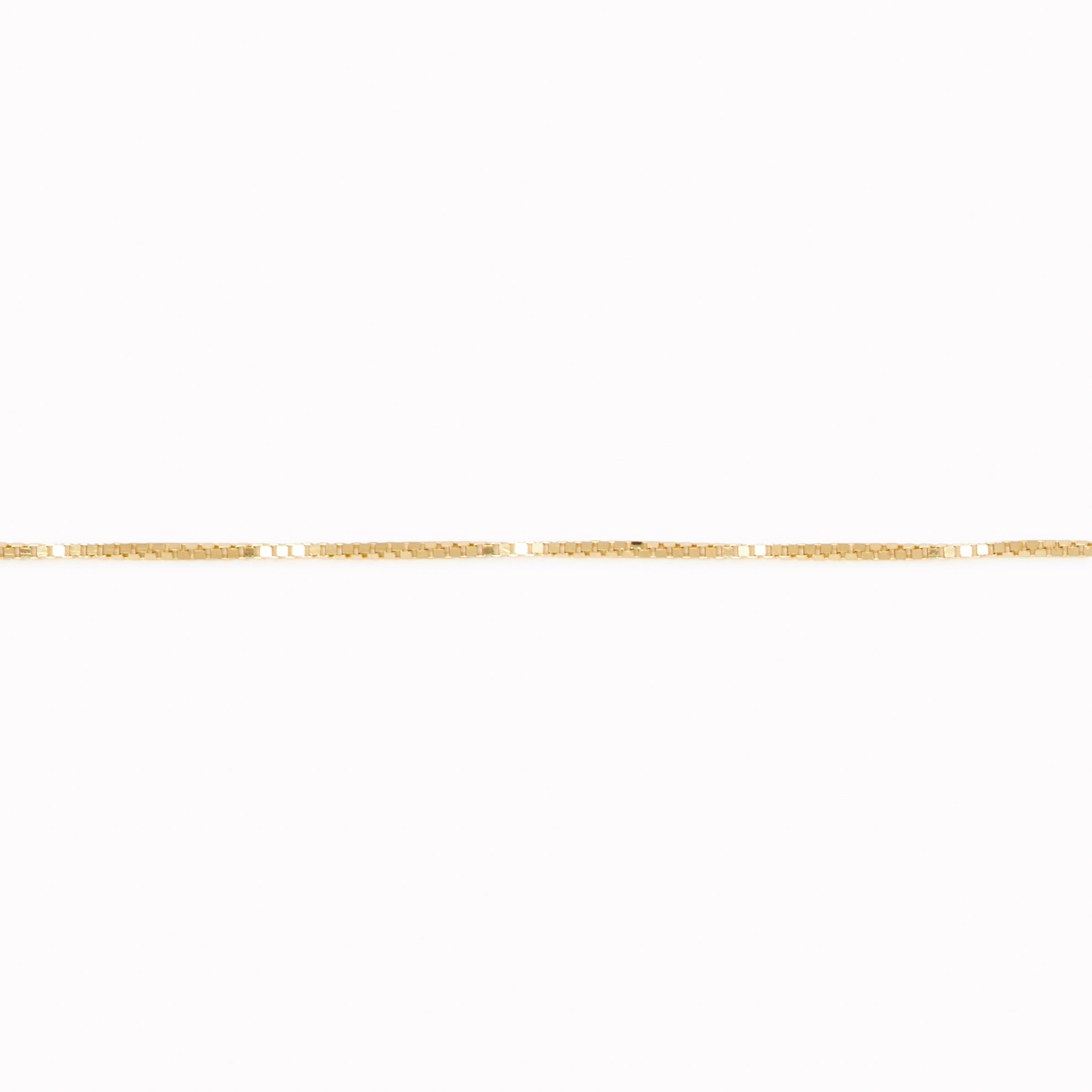 14k gold box chain necklace with a sleek, minimalistic design displayed on a clean white background