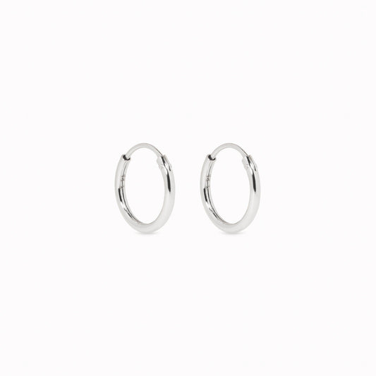 White Gold Hoops 10mm - Sonia displayed on a white background highlighting their smooth polished finish