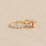 Close-up of Oval Morganite and Diamond Ring 14k Gold - Demetria with oval morganite and diamond details on beige background