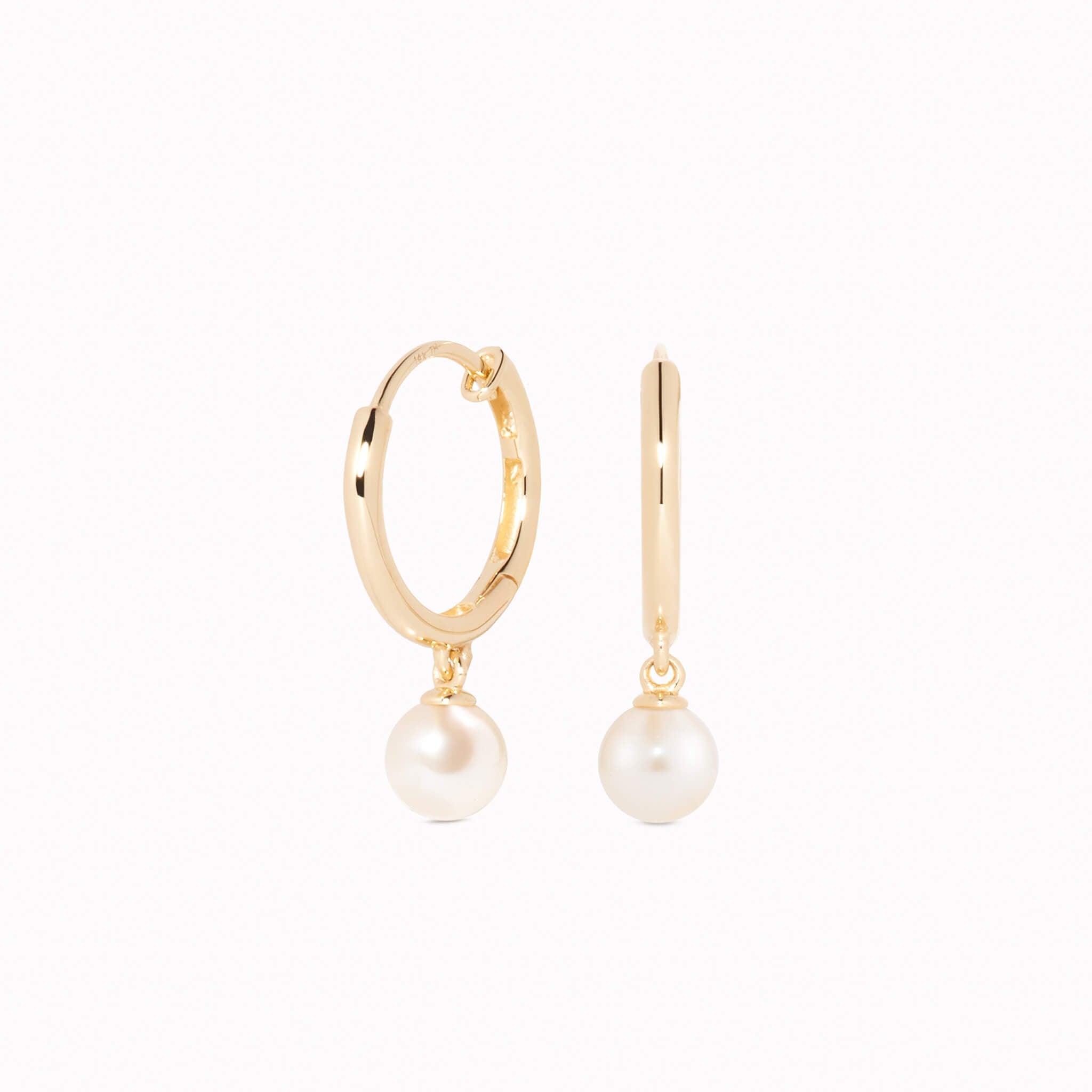 Round pearl charm hoop huggie earrings in yellow gold