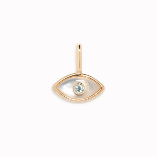 Evil Eye Charm 14k Gold with blue topaz stone set in mother of pearl and a beaded gold border on white background