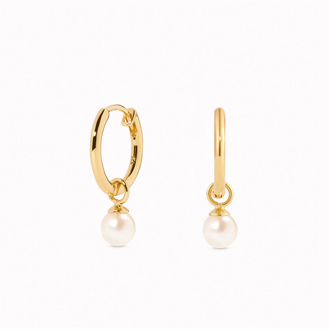 Freshwater pearl huggie earrings in gold vermeil