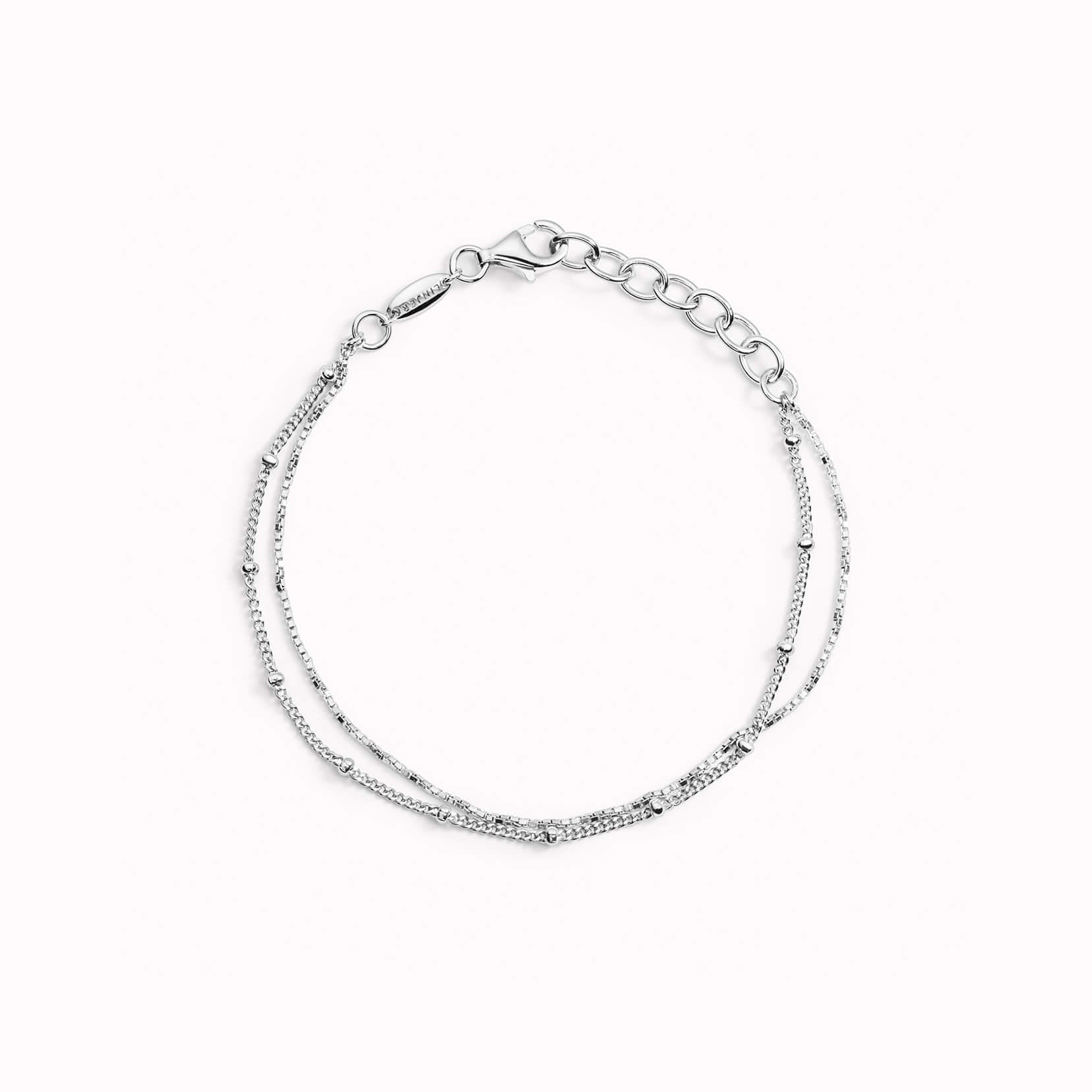 Silver chain bracelet with two chains and beaded details