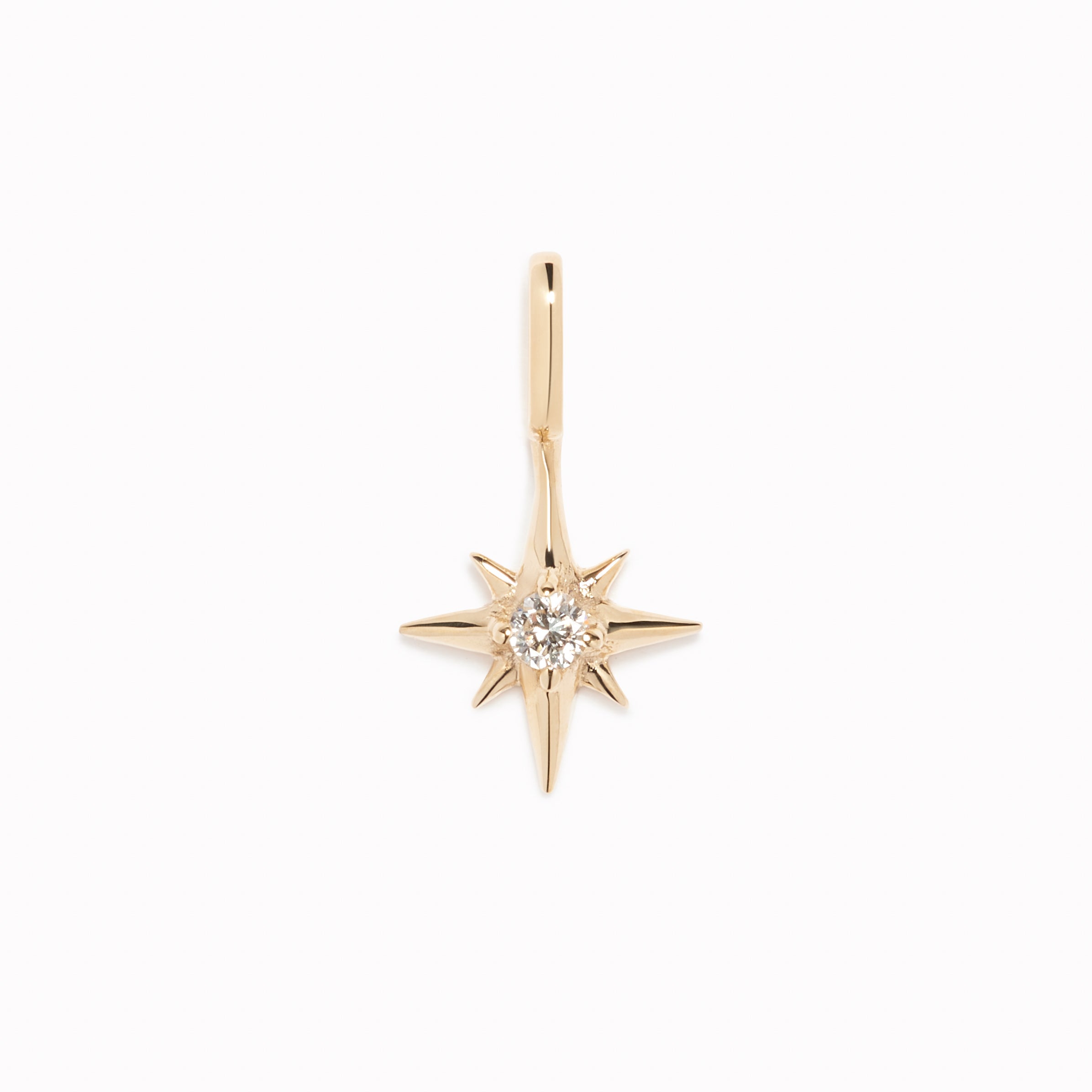 Diamond Star Charm 14k Gold pendant featuring a round-cut diamond set in polished 14k yellow gold