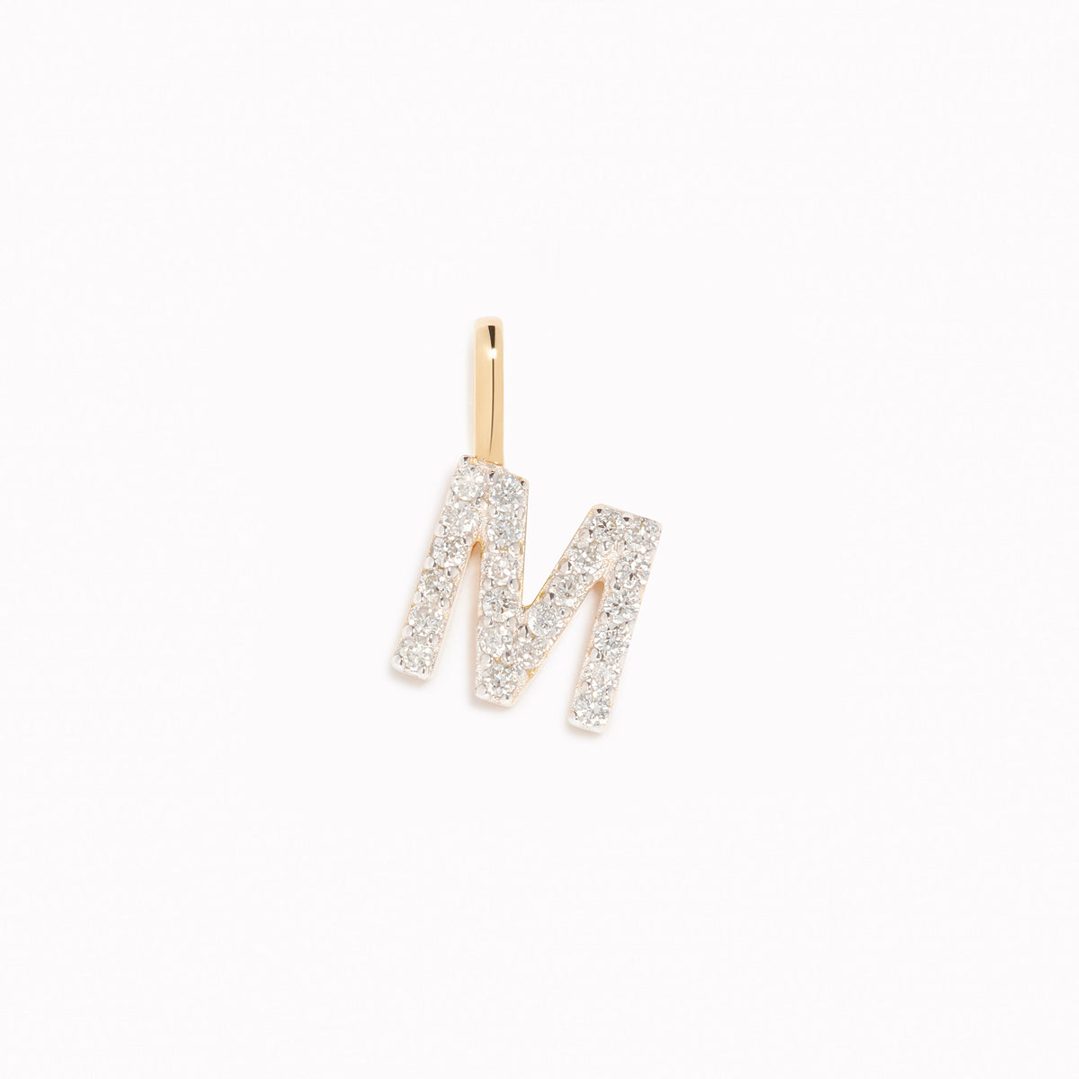 Diamond Initial Pendant 14k Gold - M with sparkling diamonds on a white background for layering on necklaces