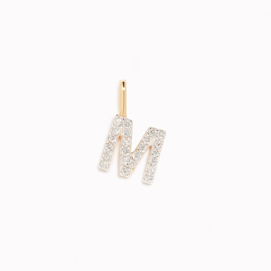 Diamond Initial Pendant 14k Gold - M with sparkling diamonds on a white background for layering on necklaces