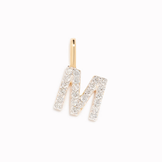 Diamond Initial Pendant 14k Gold - M with sparkling diamonds on a white background for layering on necklaces