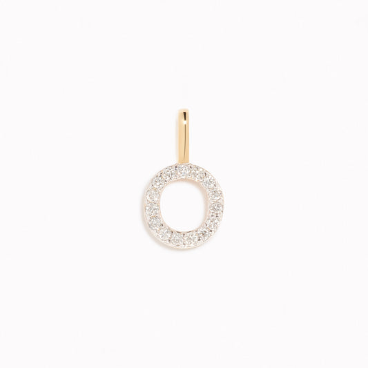 Diamond Initial Pendant 14k Gold - O with sparkling diamonds on 14k gold bail displayed on a white background