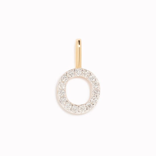 Diamond Initial Pendant 14k Gold - O with sparkling diamonds on 14k gold bail displayed on a white background