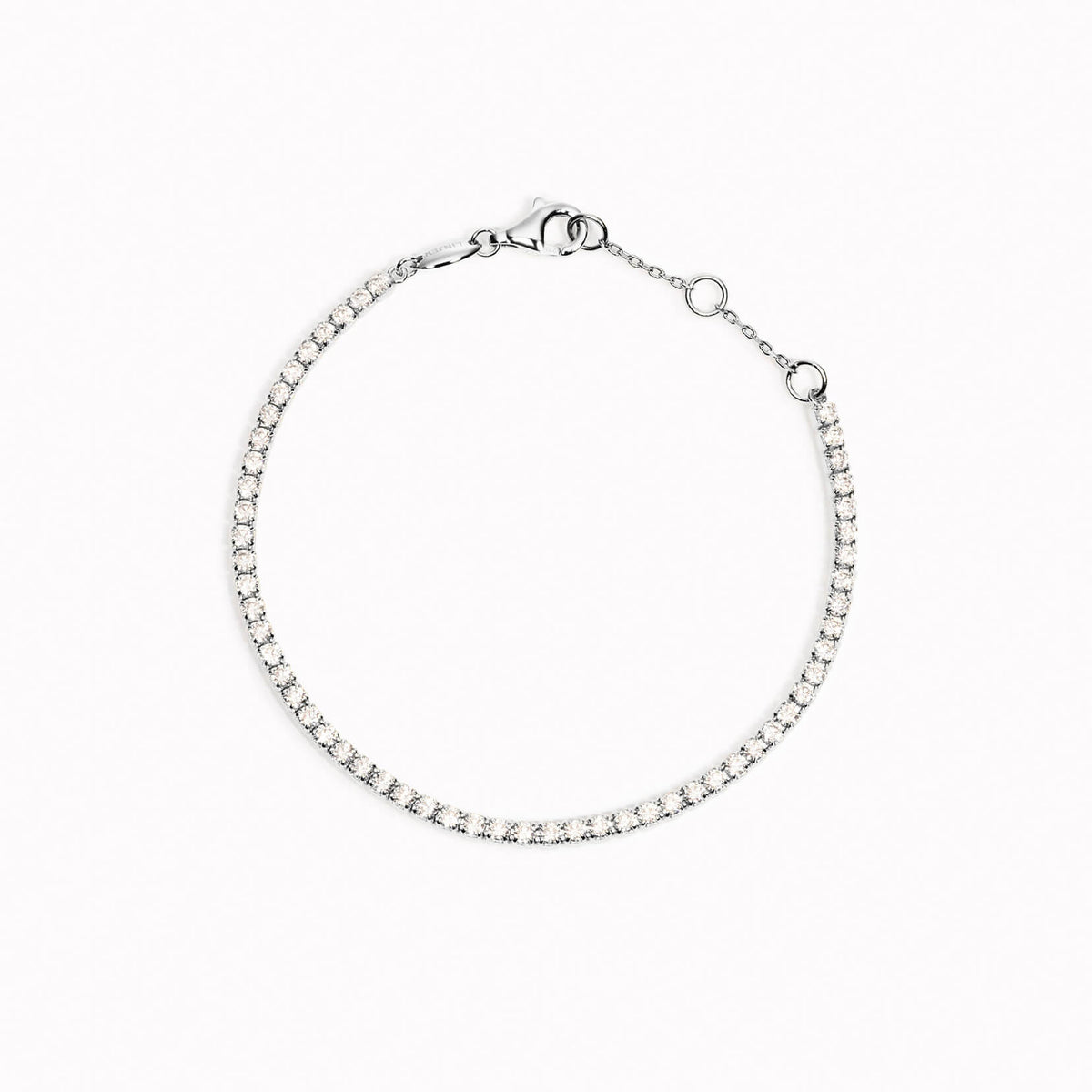 Cubic Zirconia tennis bracelet with white stones in sterling silver on white background