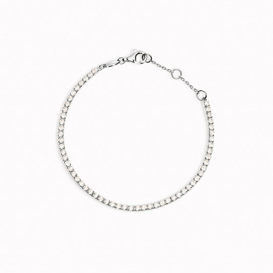 Cubic Zirconia tennis bracelet with white stones in sterling silver on white background