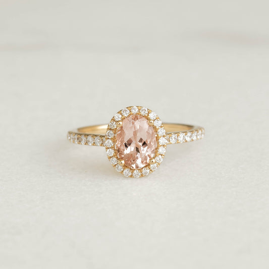 Oval Morganite Halo Ring 14k Gold - Suna with pavé diamond band displayed on a neutral background
