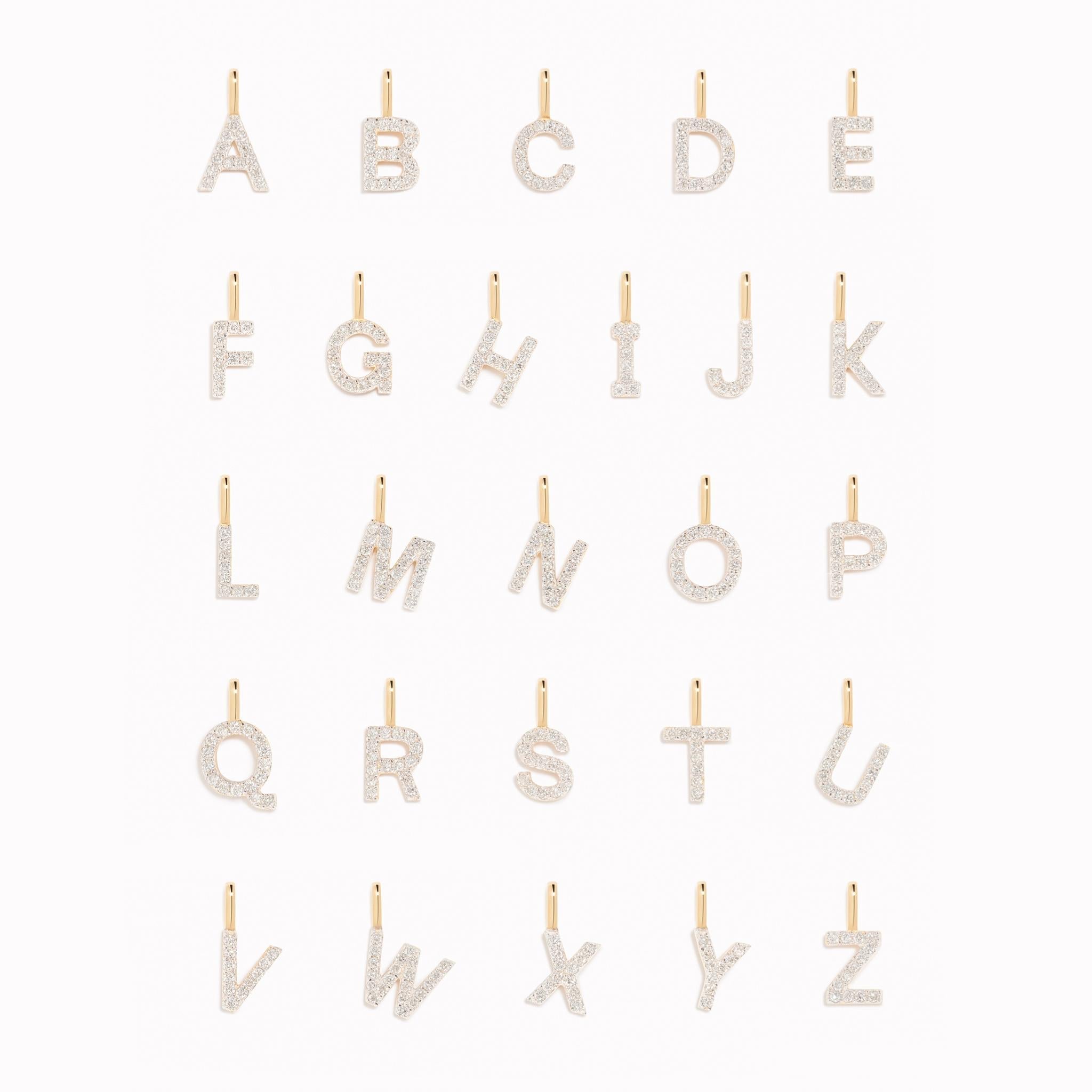 Diamond Initial Pendant 14k Gold - A collection of diamond-studded letter charms on a white background