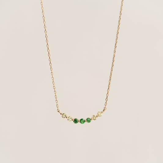 Close-up of August Birthstone Necklace 14k Gold - Ombre Tsavorite with green and light yellow gemstones on gold chain