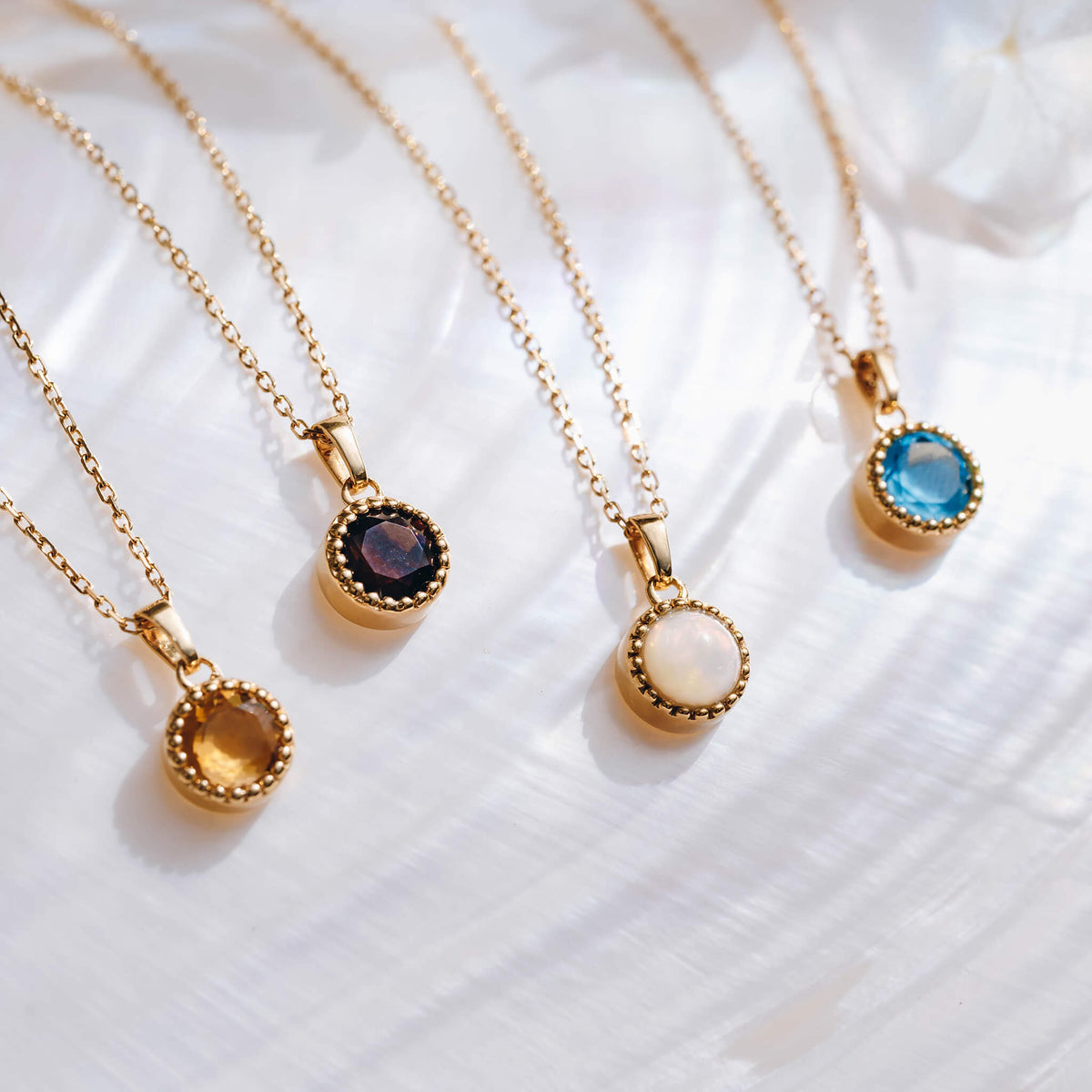 Gold birthstone necklaces
