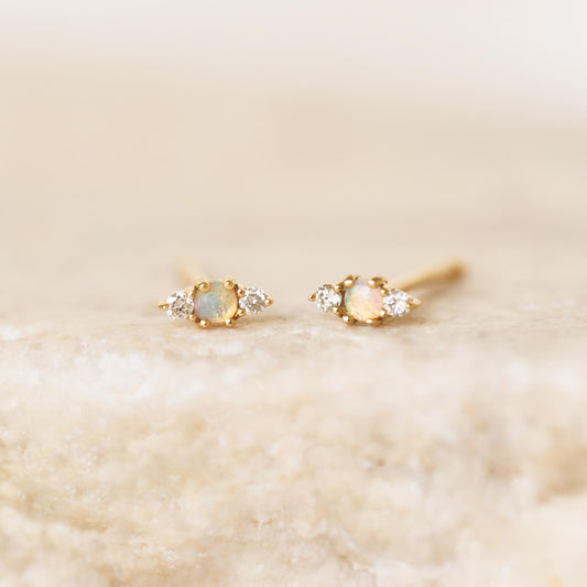 Opal and diamond stud earrings in 14k yellow gold