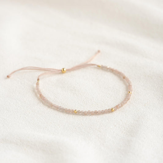 Adjustable bracelet with sunstone beads and gold vermeil bead accents