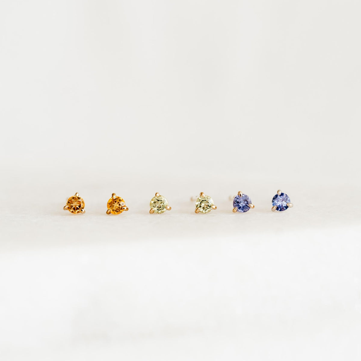 December Birthstone Stud Earrings 14k Gold - Tanzanite set with gemstones in three-prong 14k yellow gold settings