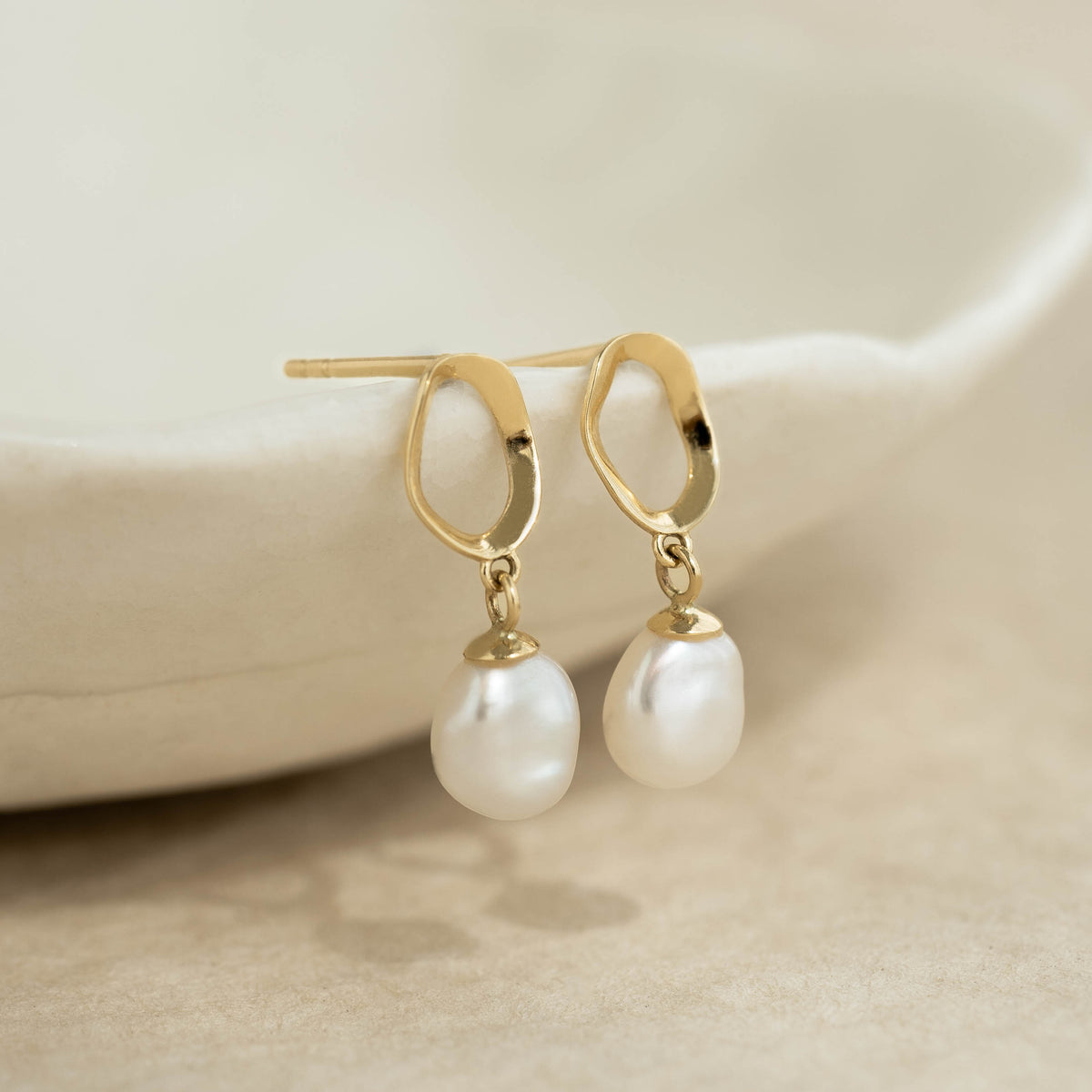 Pearl Drop Earrings 14k Gold - Marlowe featuring keshi freshwater pearls with hammered gold organic setting on neutral background