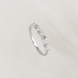 Close-up of Marquise and Round Diamond Ring White Gold - Celia featuring a delicate floral diamond design on a white gold band