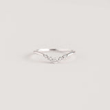 Close-up of a Graduated Diamond V Ring White Gold - Liora with five graduated diamonds on a delicate band