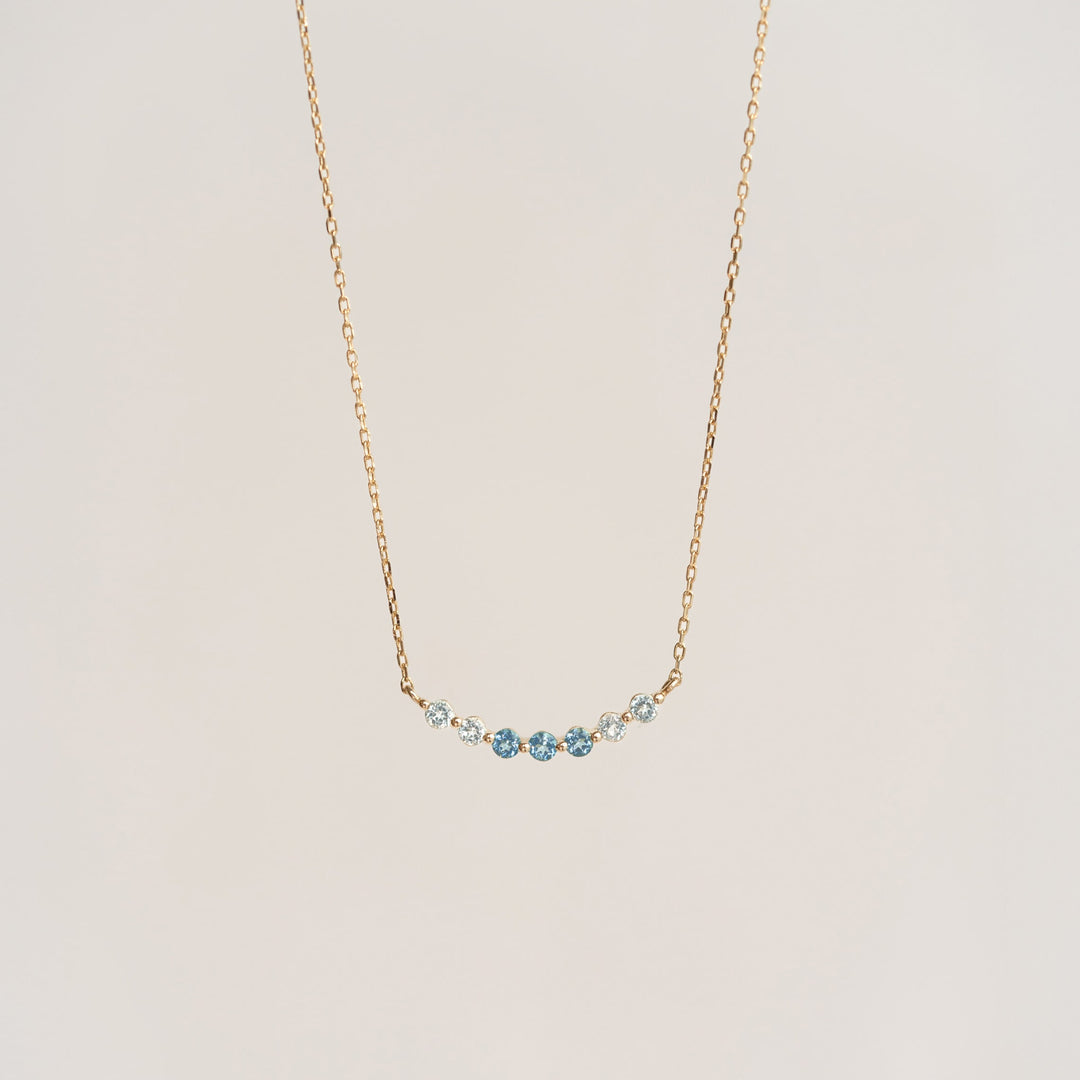 September Birthstone Necklace 14k Gold - Ombre London Blue Topaz with delicate curved gemstone arrangement on gold chain