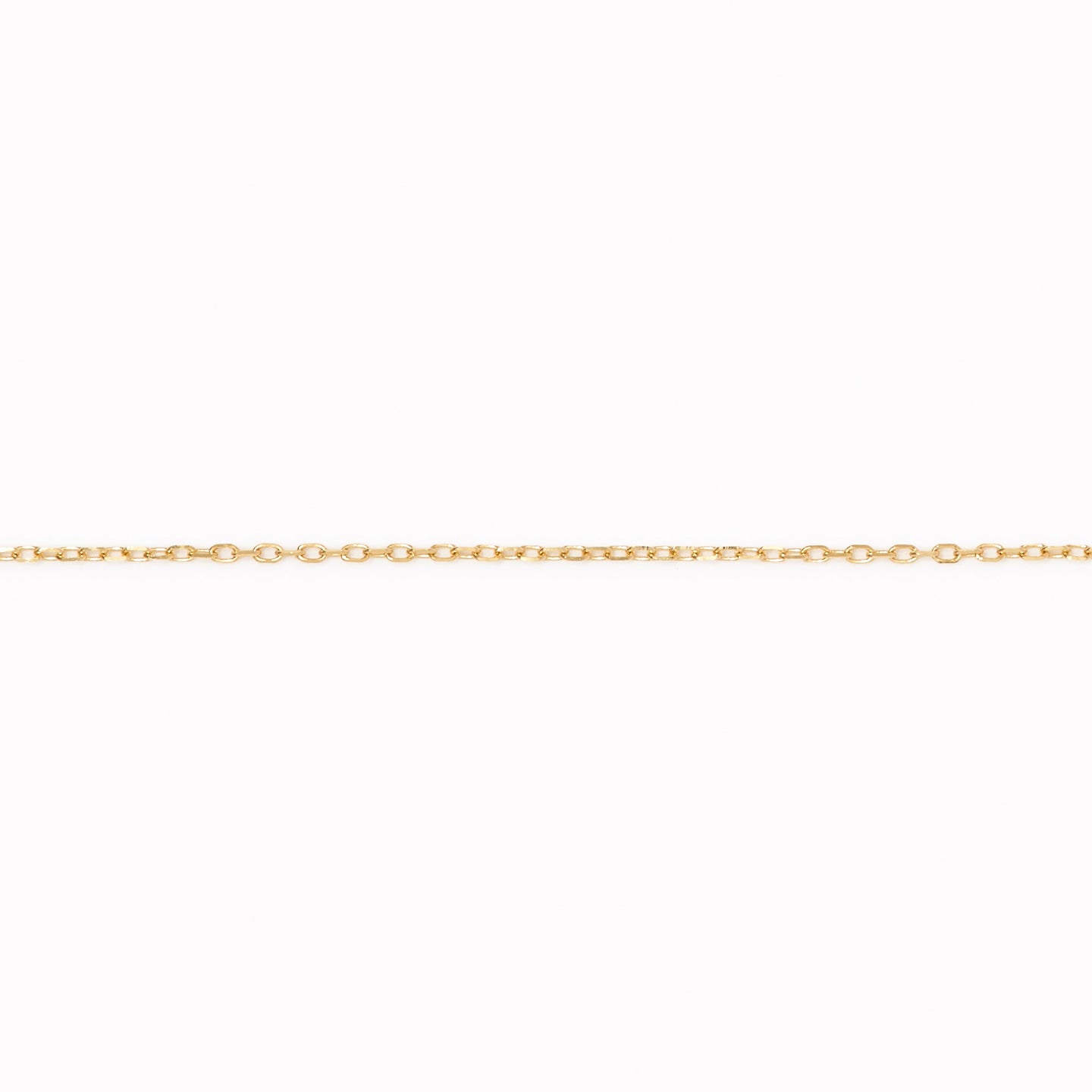 Delicate 14k gold cable chain necklace in 16 inches displayed horizontally on a white background