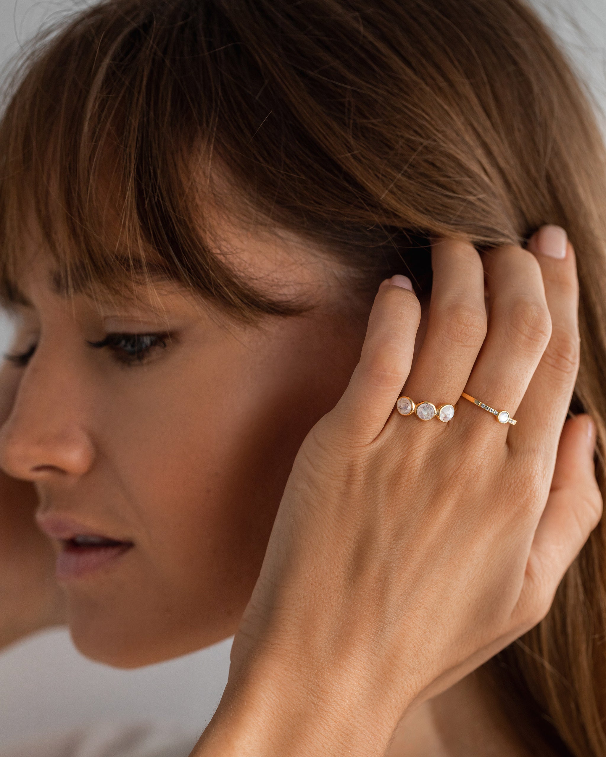 Gemstone ring with moonstones in gold vermeil on model 