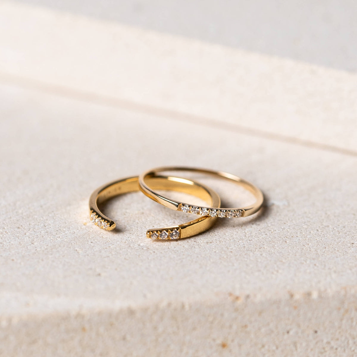 Gold vermeil stacking rings adorned with cubic zirconia
