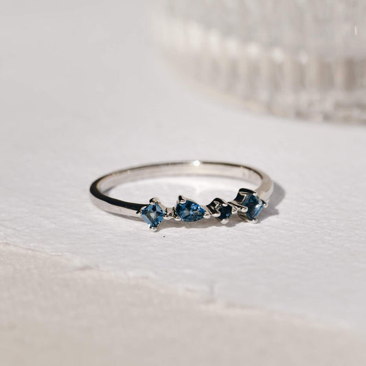 London blue topaz ring in sterling silver with irregular stones 