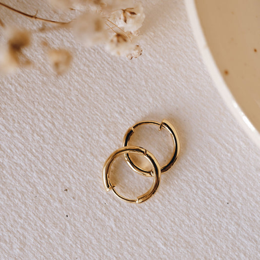 Gold huggie earrings made with gold vermeil