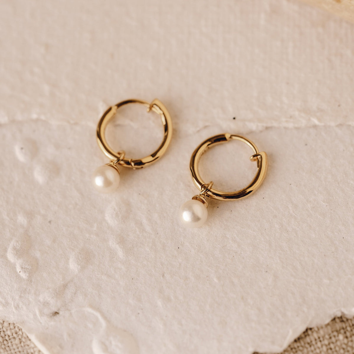 Pearl huggie earrings in gold vermeil with mini freshwater pearls 