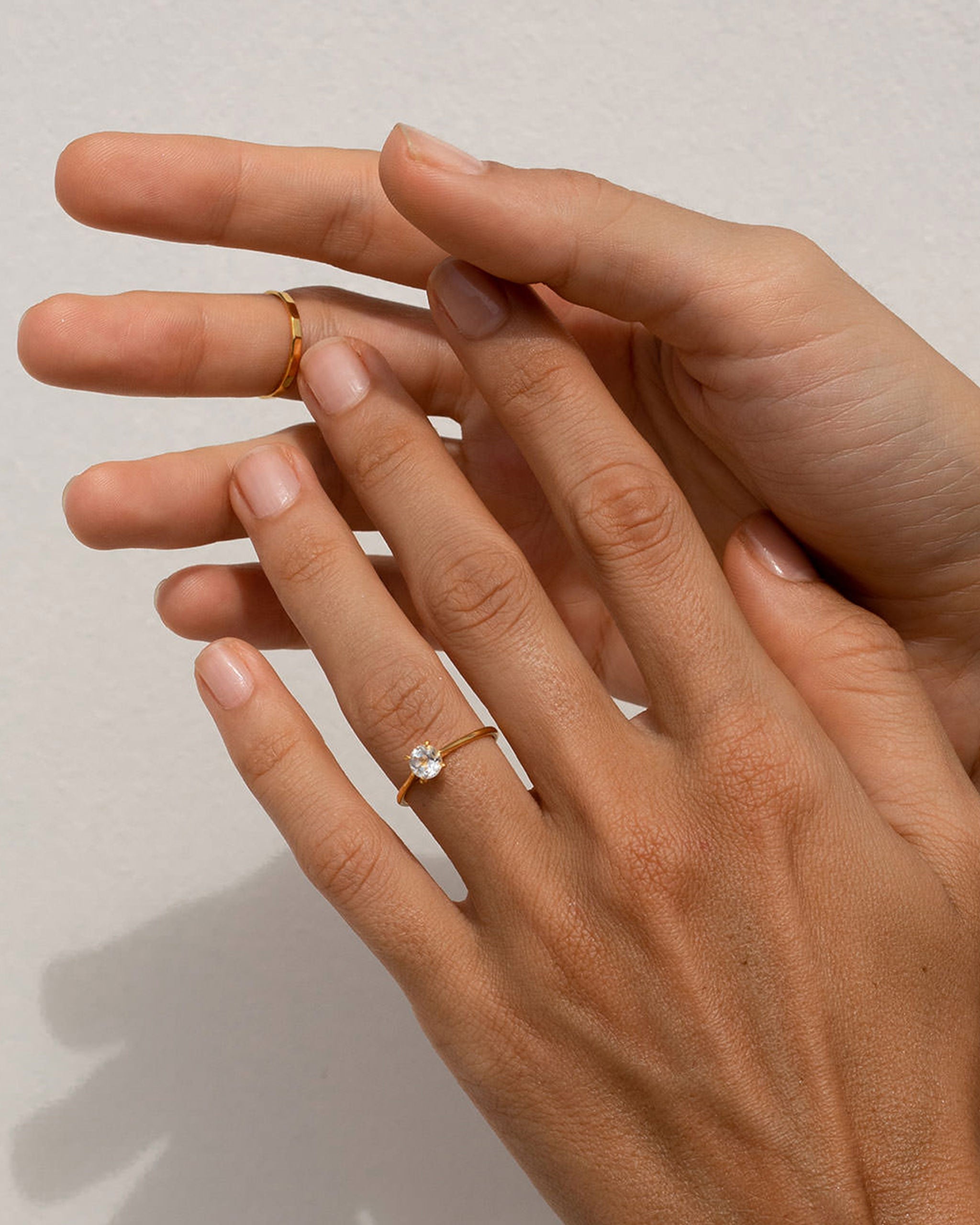 Solitaire gemstone ring made with gold vermeil on model