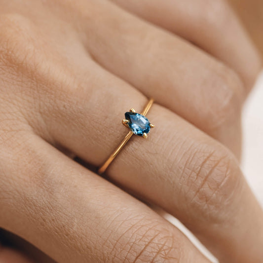 London blue topaz solitaire ring on gold vermeil band on model