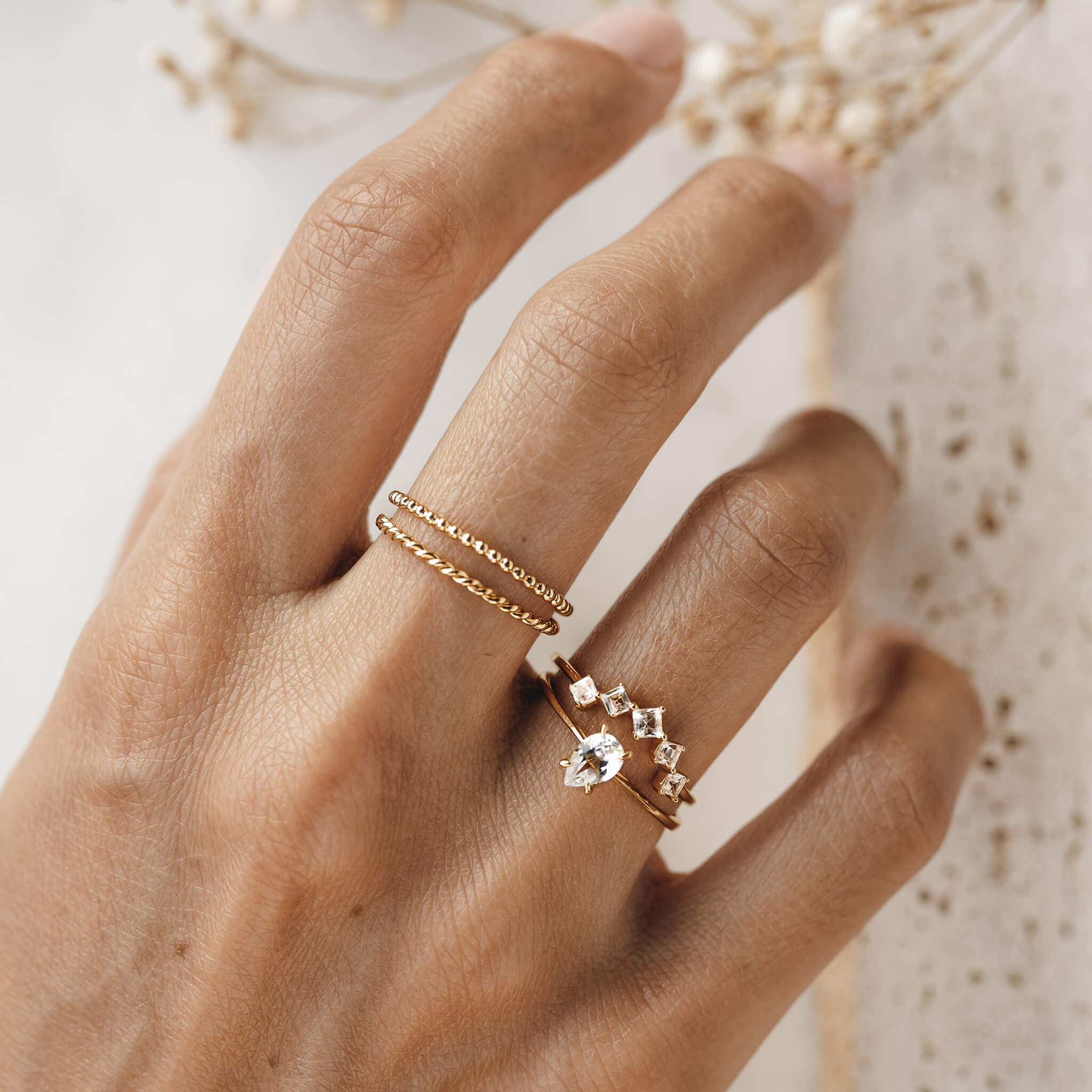 Rings with white topaz gemstone in gold vermeil