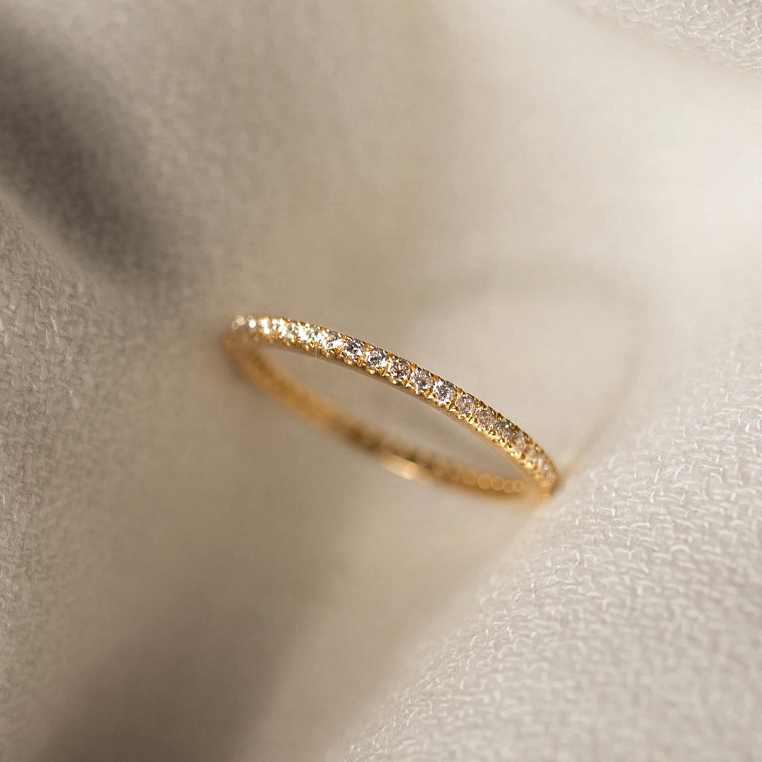 Gold vermeil eternity ring with pave set white topaz gemstones 